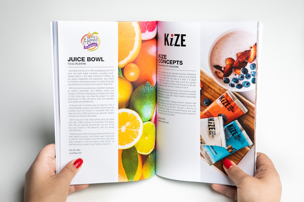 Modern print collateral arranged on a studio table
