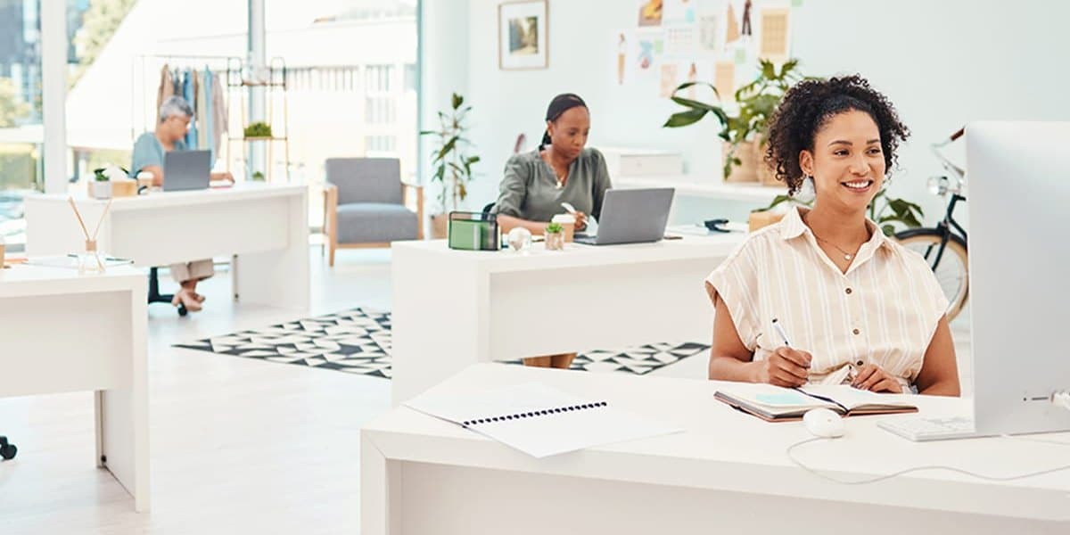 Content writer planning SEO content strategy at her desk