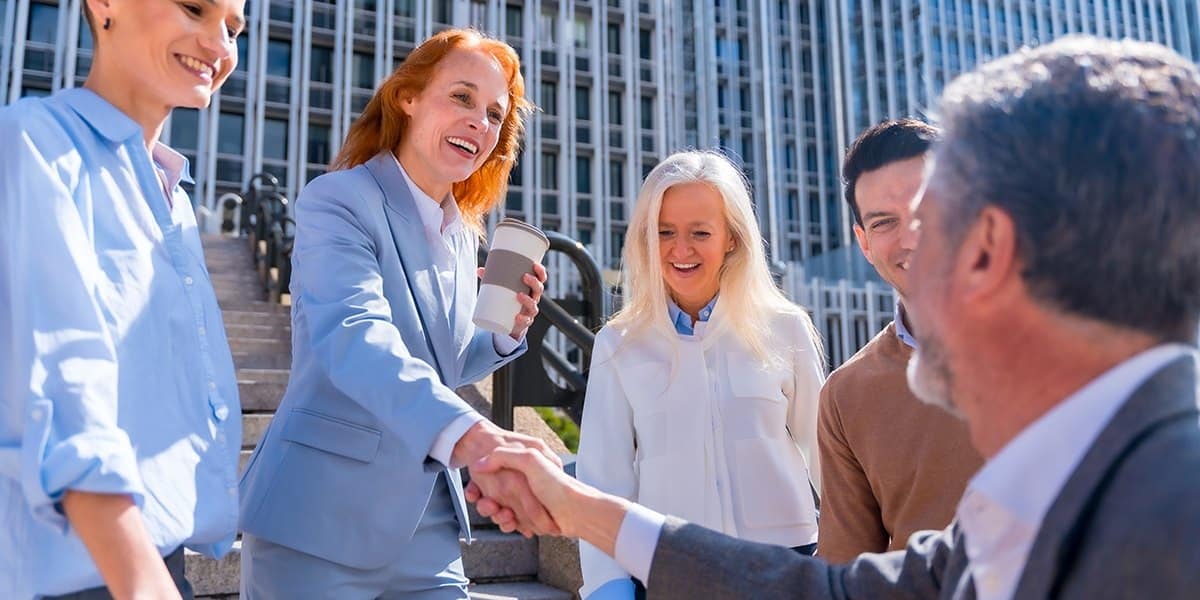 Business handshake representing link building partnerships and digital PR